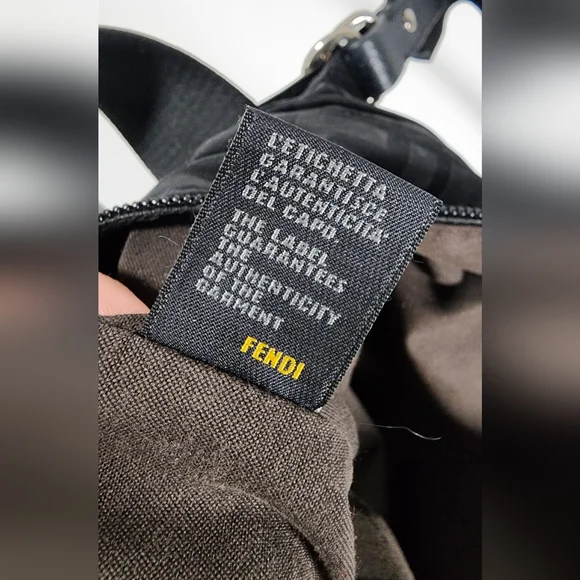 Fendi zip code hand bag. Nylon and leather